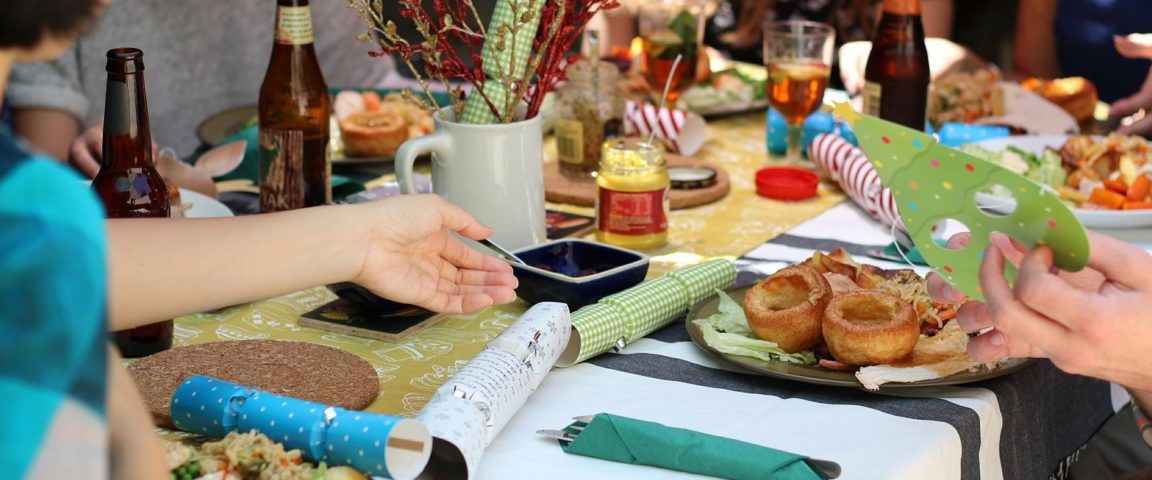 Table at party with various food and decorations